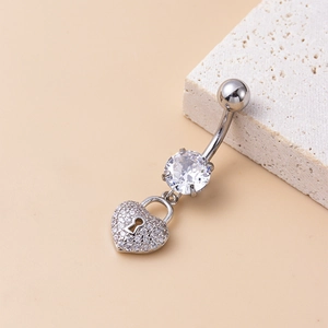 Polished silver navel ring featuring a micro-set zircon heart lock pendant and clear gems
