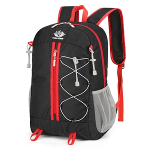 Outdoor hiking backpack in black and red with 45-degree view on white background