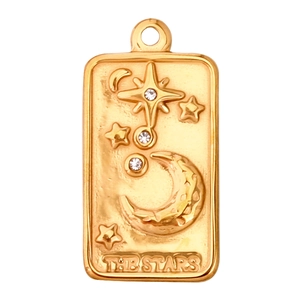 Detailed view of a gold tarot-style pendant featuring sun, star, and moon motifs