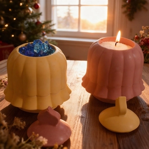 Detailed view of bell-shaped striped resin storage jars with candle containers