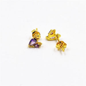 Elegant gold plated stud earrings with teardrop purple zircon in a minimalist design
