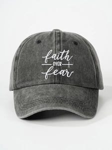 Close-up of Faith Over Fear embroidery on washed grey vintage adjustable baseball cap
