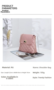 Pink quilted bucket bag detail with heart-shaped metal lock and gold chain strap
