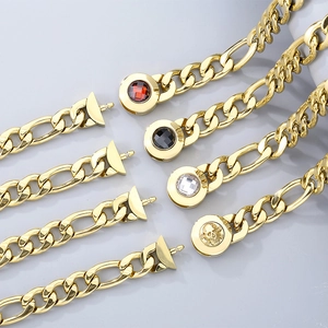 Detailed view of gold plated titanium link chain clasps with gems and skull motif