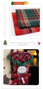 Detailed view of red and green Christmas plaid fabric used for floral bouquet packaging