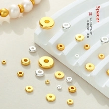 Macro detail of assorted gold and silver spacer beads for DIY handmade jewelry crafts