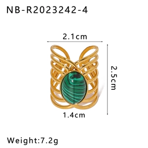 Detail of adjustable hollow gold-plated steel ring with turquoise stone inlay and dimensions