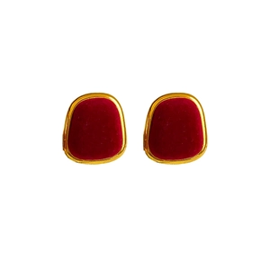 Elegant gold square earrings with red flocking velvet insert on a clean white background