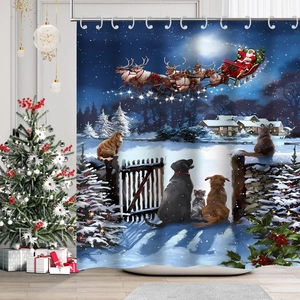 Detail of Christmas shower curtain featuring Santa and reindeer in a festive bathroom setting