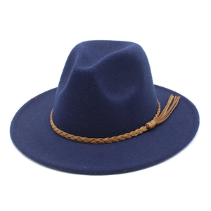 Navy blue wool Fedora hat featuring a brown braided leather band and decorative tassels