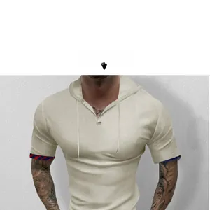 Detail of men's apricot waffle knit hoodie with plaid cuff and lace-up V-neckline