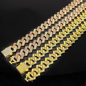 Iced-out 15mm Cuban link chains in gold and rose gold with diamond-encrusted box clasp