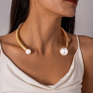 Minimalist gold spiral choker necklace for women with faux pearl accents and open design