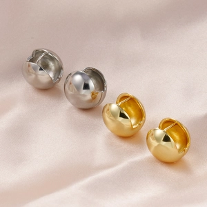 Polished ball button hoop earrings in 18K gold and silver plating on champagne silk