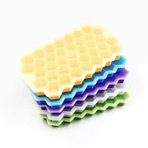 Set of six colorful honeycomb silicone ice cube trays in diverse vibrant colors