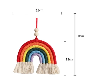 Detailed view of handmade woven rainbow wall decor with 15cm width and 30cm total length