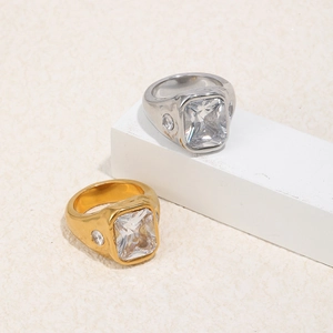 Wide 18K gold and silver plated stainless steel ring with rectangular crystal and side zircon