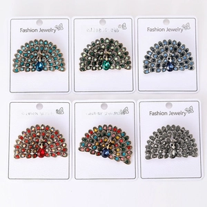Detailed grid showing peacock brooches with sparkling multicolored rhinestones