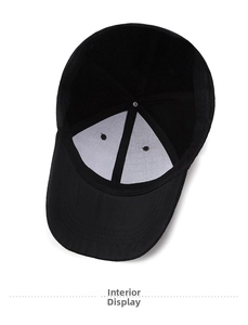 Interior view of black baseball cap showing reinforced white lining and durable stitching