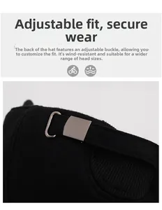 Detail of adjustable metal buckle and textured fabric on the back of a winter baseball cap
