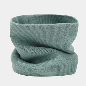 Detailed texture of morandi green knitted neck warmer with dense ribbed fabric pattern