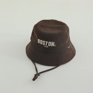 Detail of brown corduroy bucket hat for kids with Boston embroidery and adjustable chin strap