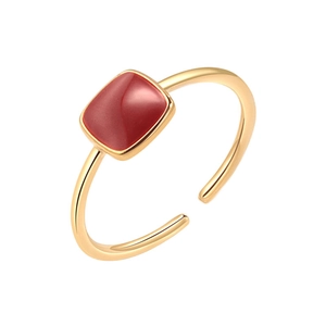 Minimalist gold-plated open ring with red square enamel cabochon on a white background