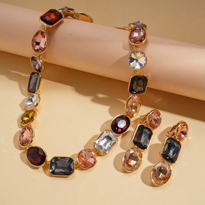 Luxe bohemian geometric sweater necklace and earring set with colorful crystals