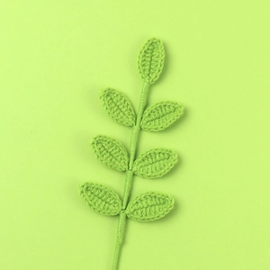 Handmade crochet green leaf branch made of soft cotton yarn for floral decoration