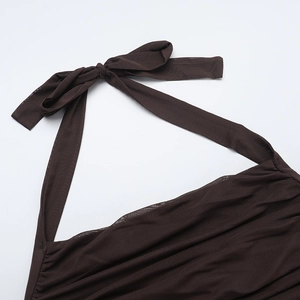 Detail of dark brown mesh fabric showing ruching texture and halter neck tie design