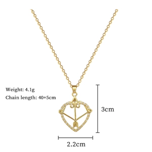 Detail view of cupid heart pendant with size and weight specs for gold necklace