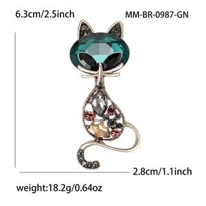 Luxury crystal cat brooch with emerald green stones and black diamonds in 6.3cm size