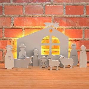 Belén minimalista de madera para Navidad con siluetas de la Sagrada Familia cortadas con láser