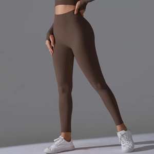Detailed side view of high waist seamless coffee yoga pants with ribbed tummy control