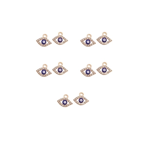 Detailed view of ten irregular gold heart charms with blue evil eye and sparkling crystals