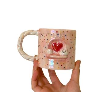 Pink ceramic puppy mug with colorful dots and relief 3D heart, braided handle