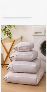 Set of mesh laundry bags in various sizes with durable zippers for washing machine protection