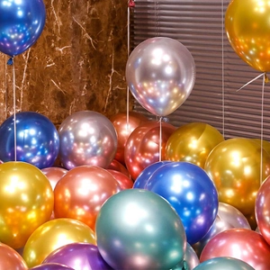 Macro detail of glossy metallic chrome latex balloons in mixed colors for party decor