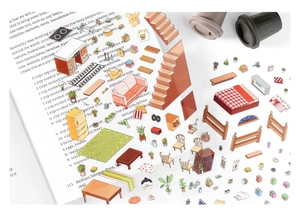 Macro shot of cute indoor furniture and cartoon stickers on a creative design paper