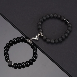 Magnetic heart couple bracelets with black polished beads and volcanic lava stones