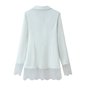 Detail of white long sleeve blazer back showing elegant lace splicing on cuffs and hem