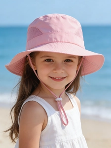 Close-up of pink breathable sun hat for kids with mesh vents and adjustable chin strap