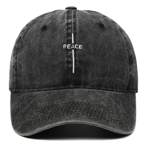 Vintage washed black denim baseball cap featuring white PEACE letter embroidery