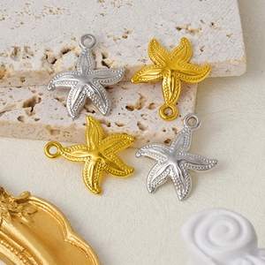Detailed view of silver and gold starfish charms made of 304 stainless steel