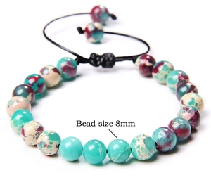 Close-up of 8mm natural stone beads on a handmade adjustable woven cord bracelet