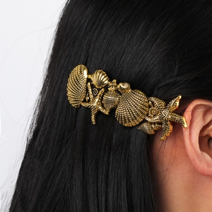 French retro gold starfish and seashell alloy hair clip on long black hair
