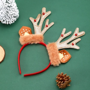 Serre-tête bois de renne de Noël avec paillettes dorées et cloches sur fond vert