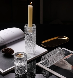 Detailed view of embossed diamond texture on clear glass candle holders set