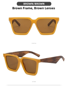 Detail view of square oversized sunglasses with brown tea frames and wood grain temples