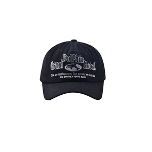 Detailed view of high-quality dolphin and letter embroidery on black cotton baseball cap
